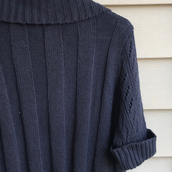 Go from winter to spring in this cute short sleeve navy blue cardigan. - Picture 7 of 8